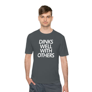 man wearing dark gray dinks well with others athletic performance pickleball shirt apparel front view