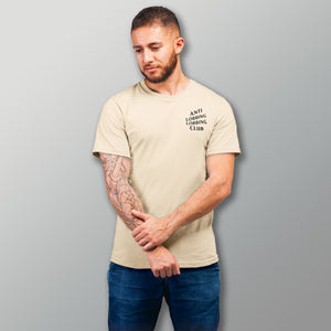 man wearing anti-lobbing lobbing club tan cream pickleball apparel shirt front view