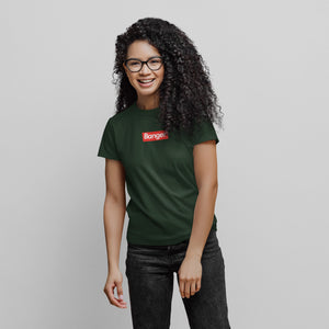 girl wearing forest green banger pickleball shirt with white banger text on red background supreme style phenom front view