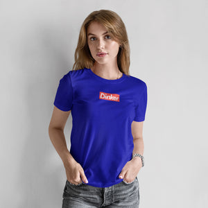 woman wearing royal blue dinker pickleball shirt apparel supreme inspired front view