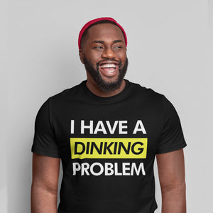 smiling man wearing unisex black i have a dinking problem pickleball shirt apparel front view
