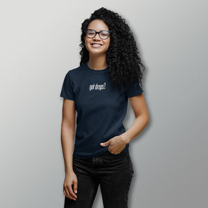 smiling woman with glasses wearing navy blue got drops pickleball shirt apparel front view