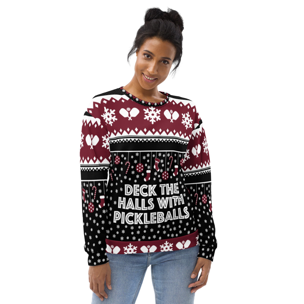 smiling woman wearing deck the halls with pickleballs ugly christmas sweater pickleball apparel