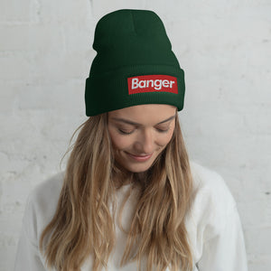 woman wearing forest green pickleball beanie hat sock cap with white banger text on red background supreme style
