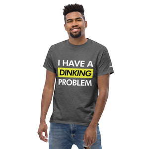 smiling man wearing dark heather gray I have a dinking problem pickleball shirt apparel front view