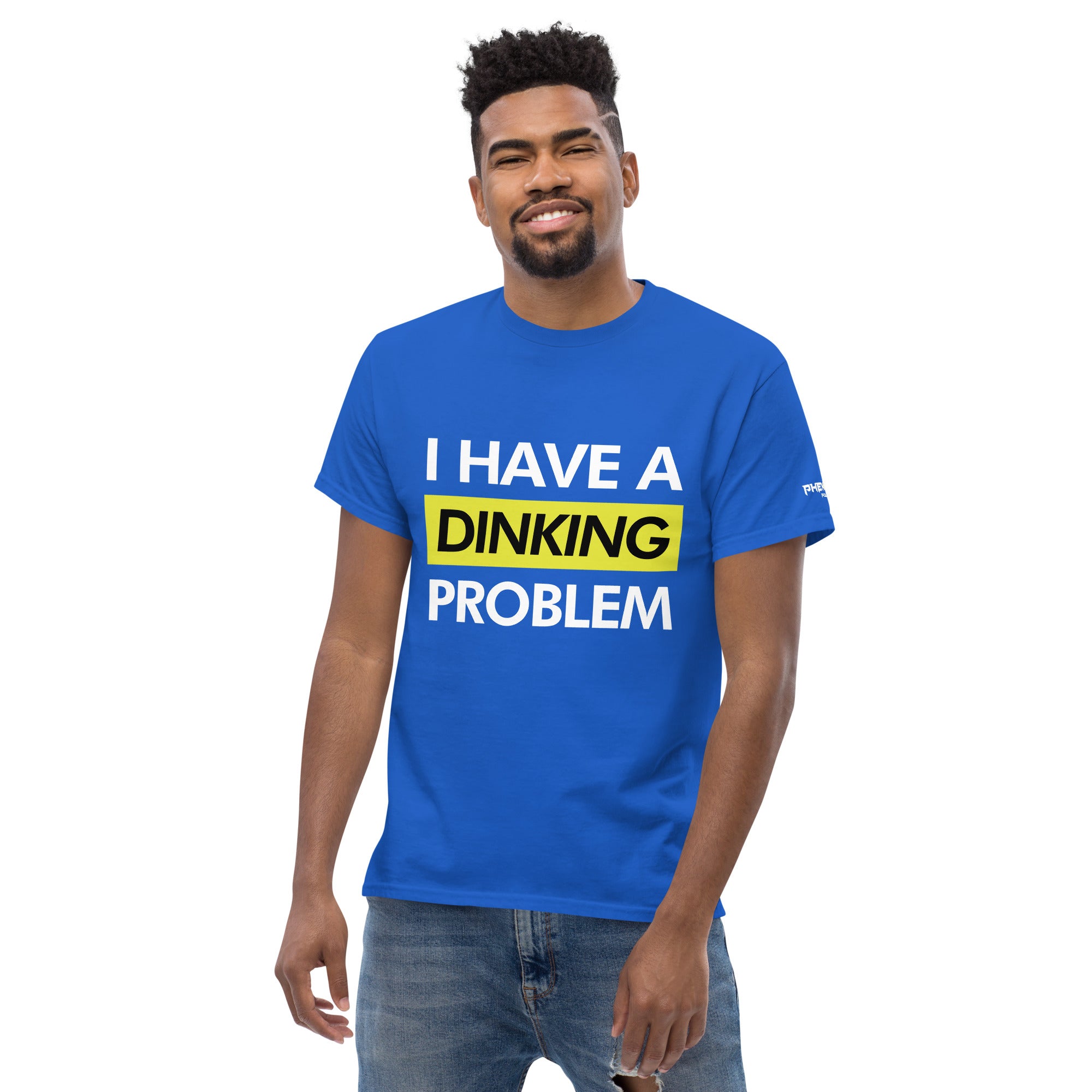smiling man wearing royal blue I have a dinking problem pickleball shirt apparel front view