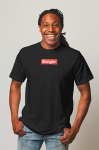 smiling man wearing black banger pickleball shirt with white text on red background supreme style phenom front view
