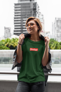 smiling asian woman wearing forest green dinker pickleball shirt apparel supreme inspired front view