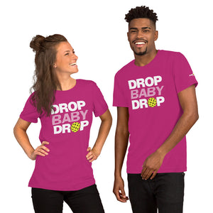 smiling couple wearing magenta hot pink drop baby drop pickleball shirt apparel front view