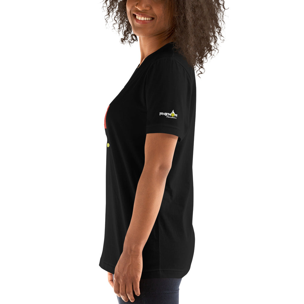 smiling woman with curly hair wearing black don't coach me bro pickleball shirt apparel phenom logo left side view