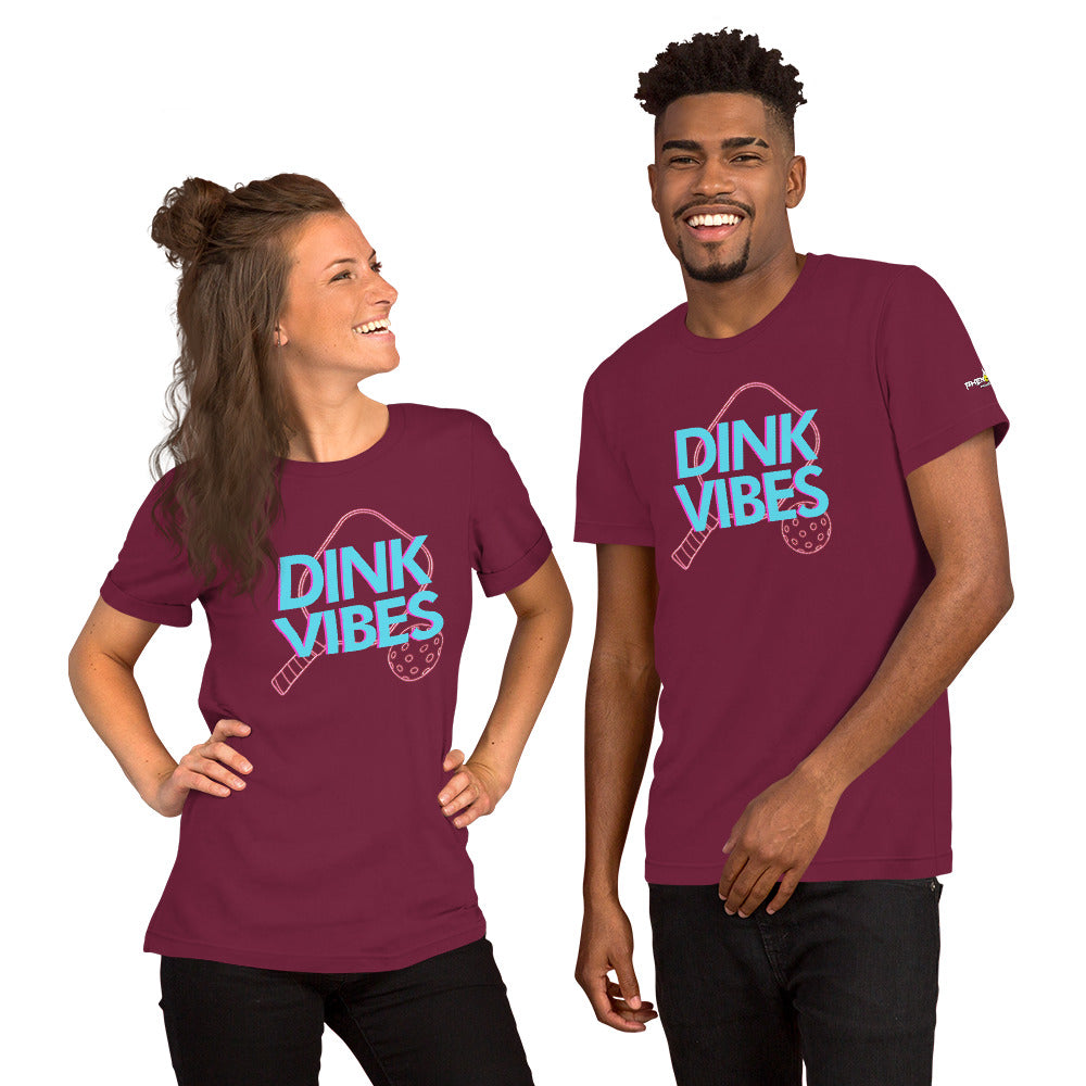 smiling couple wearing maroon dink vibes neon inspired pickleball apparel shirt front view