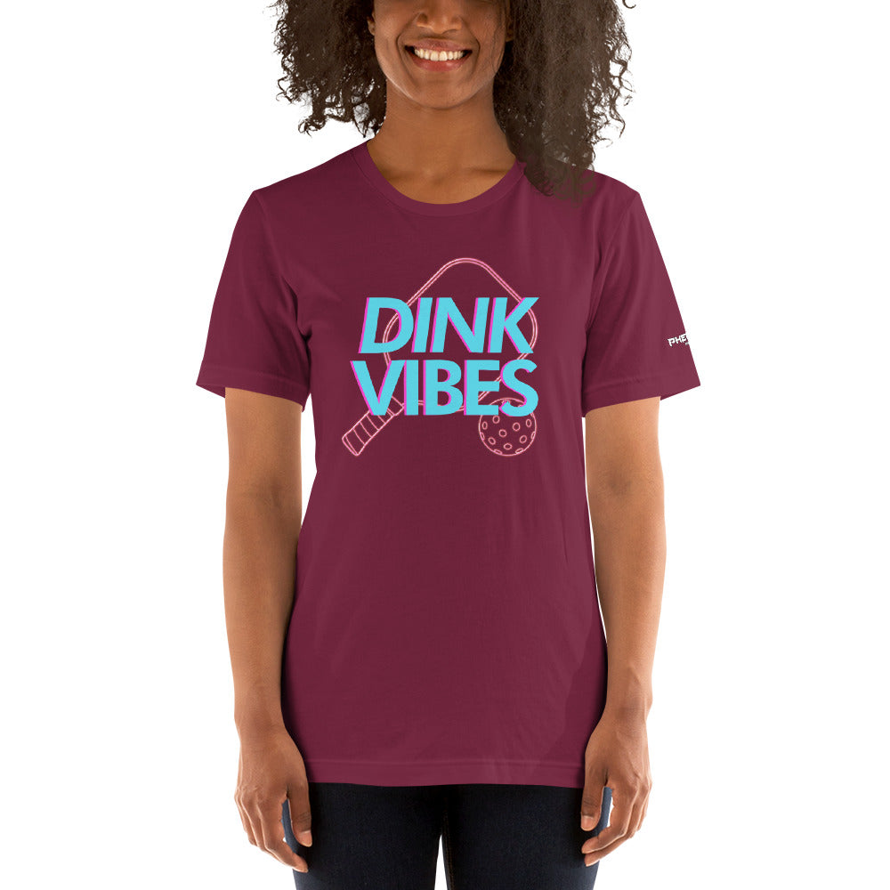 smiling woman maroon dink vibes neon inspired pickleball apparel shirt front view
