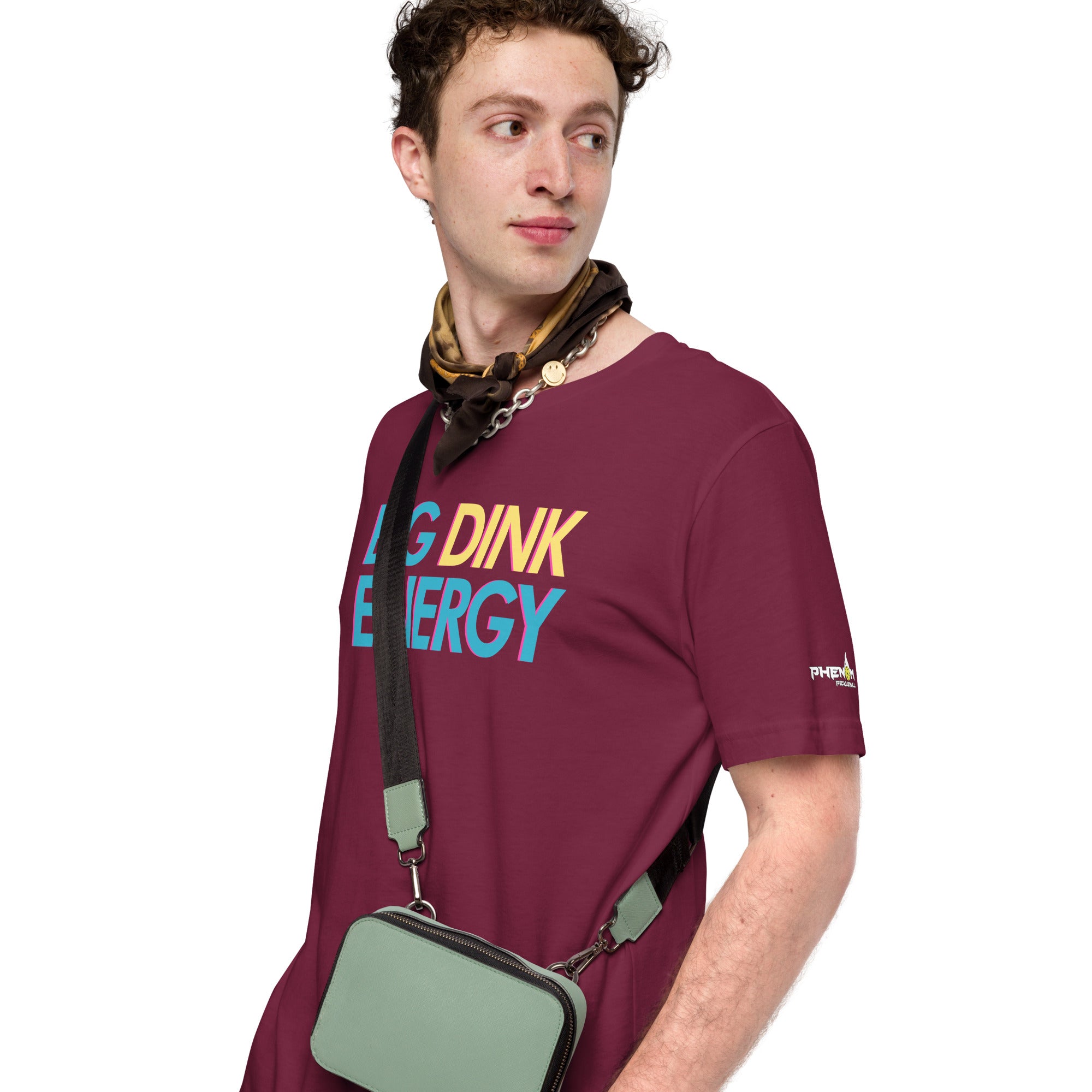 man wearing maroon big dink energy pickleball apparel shirt phenom logo side view
