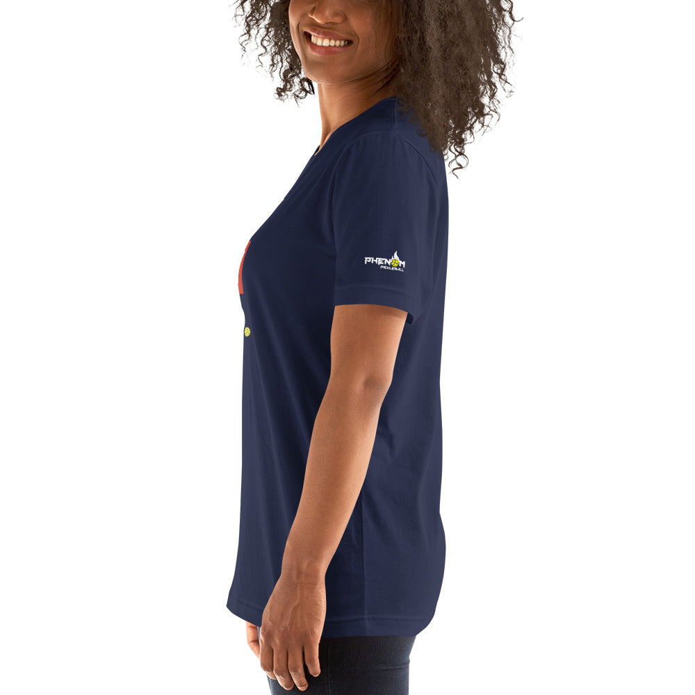smiling woman with curly hair wearing navy blue don't coach me bro pickleball shirt apparel phenom logo left side view