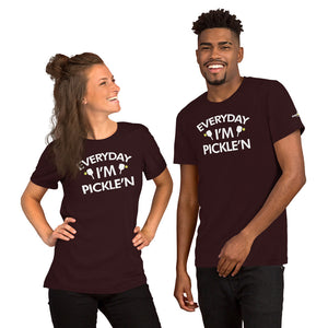 smiling couple wearing dark maroon burgundy everyday I'm pickle'n pickleball shirt apparel front view