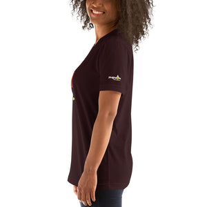 smiling woman with curly hair wearing dark maroon burgundy don't coach me bro pickleball shirt apparel phenom logo left side view
