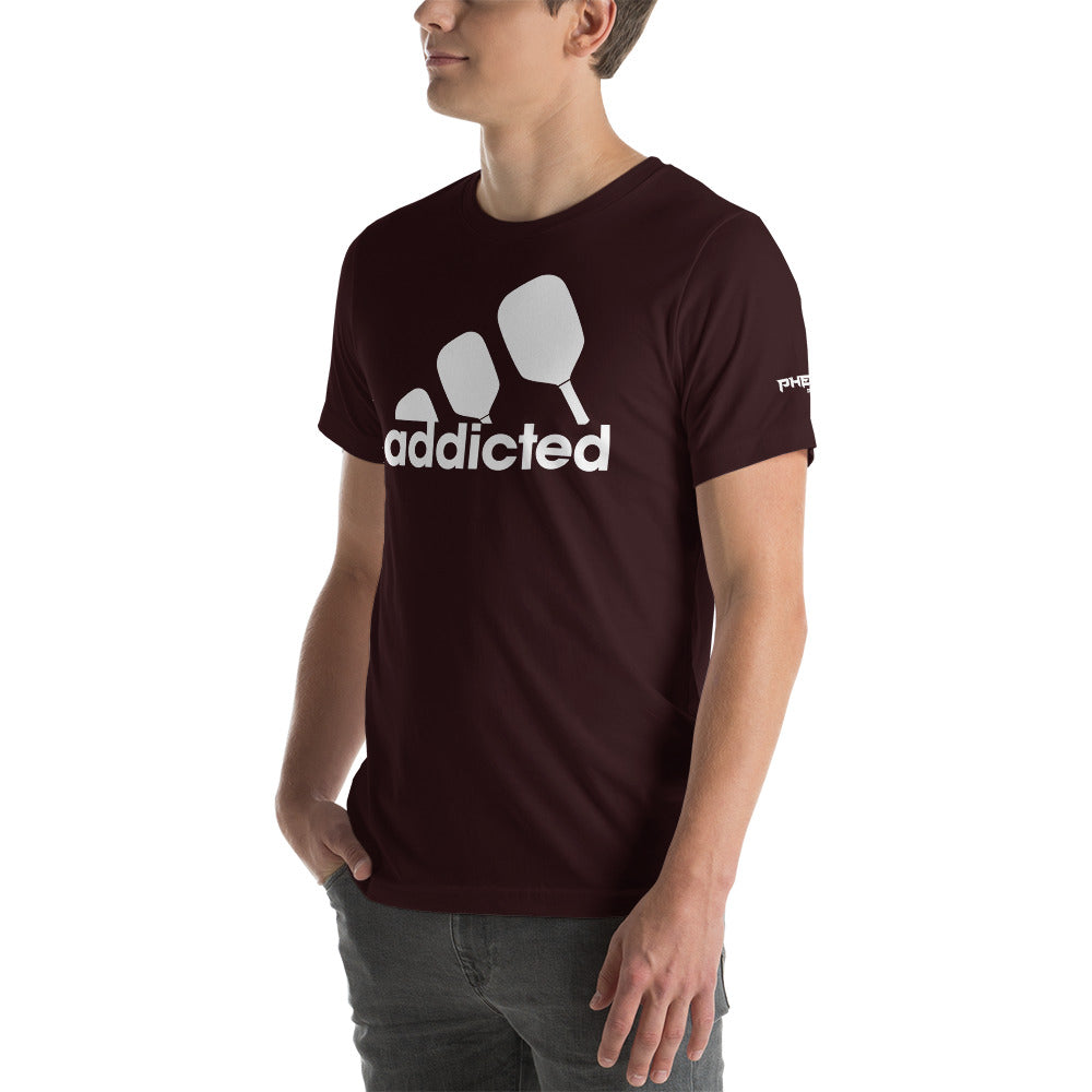 young man wearing dark maroon addicted pickleball shirt side view