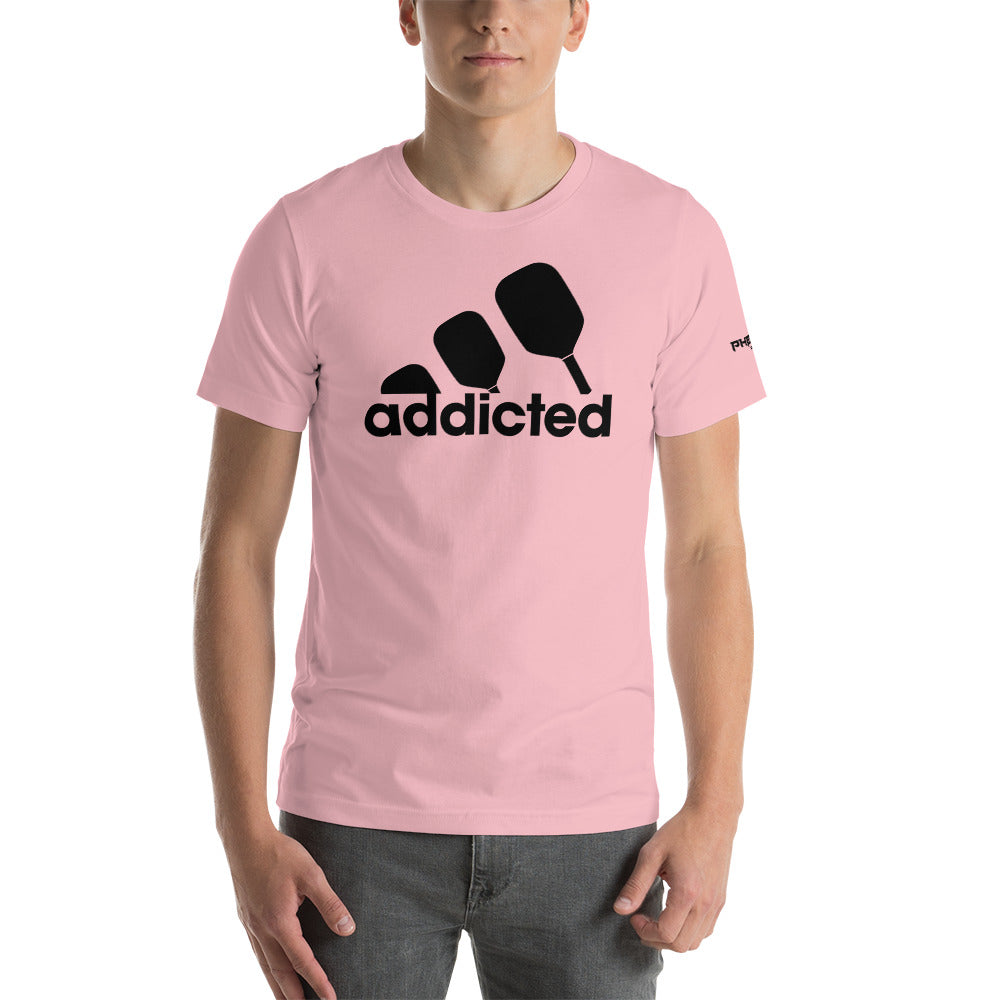 man wearing pink addicted pickleball shirt