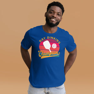 smiling man wearing royal blue day dinking champion retro inspired pickleball shirt apparel front view