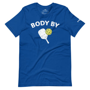 royal blue body by pickleball shirt apparel with paddle and ball weathered look front view
