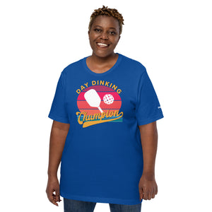 smiling plus sized woman wearing royal blue day dinking champion retro inspired pickleball shirt apparel front view