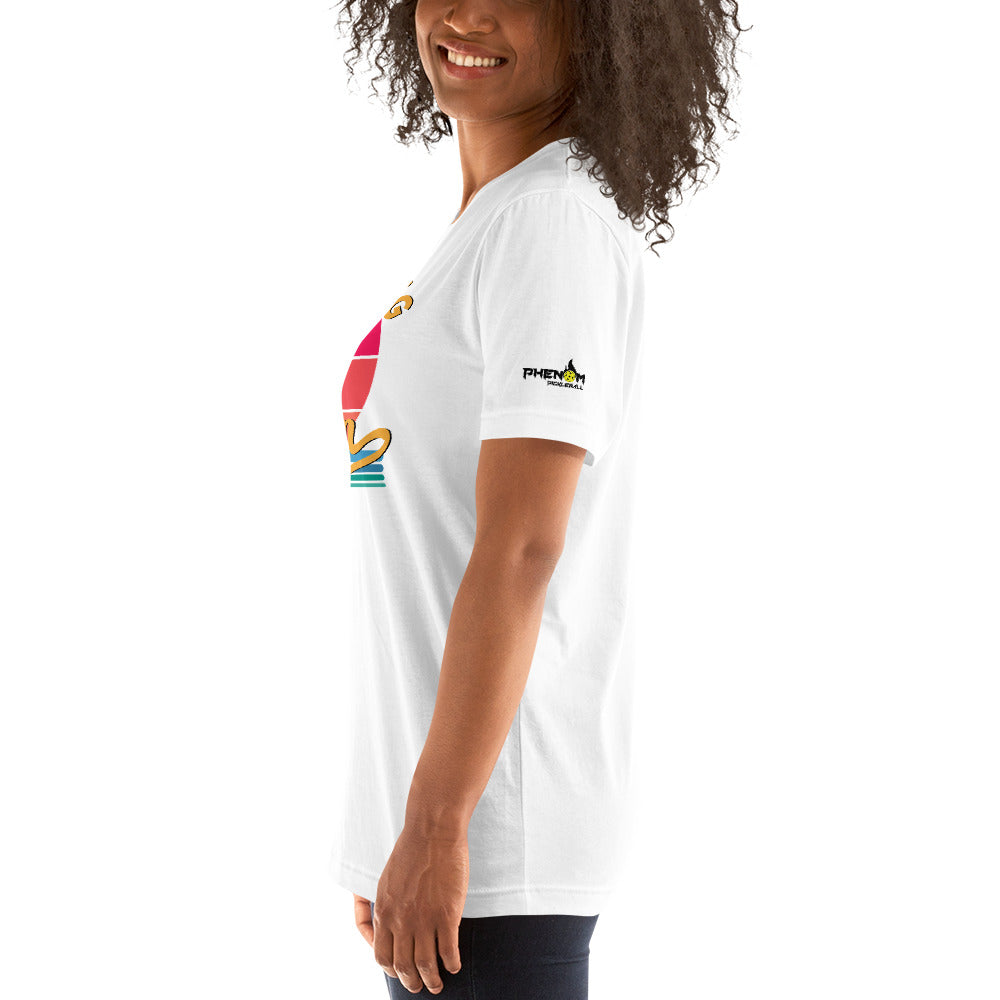 smiling woman wearing white day dinking champion retro inspired pickleball shirt apparel phenom logo left side view