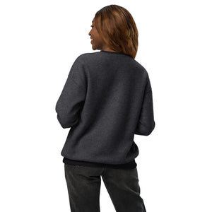 smiling woman wearing dark gray fleece embroidered big dink energy pickleball sweater apparel back view