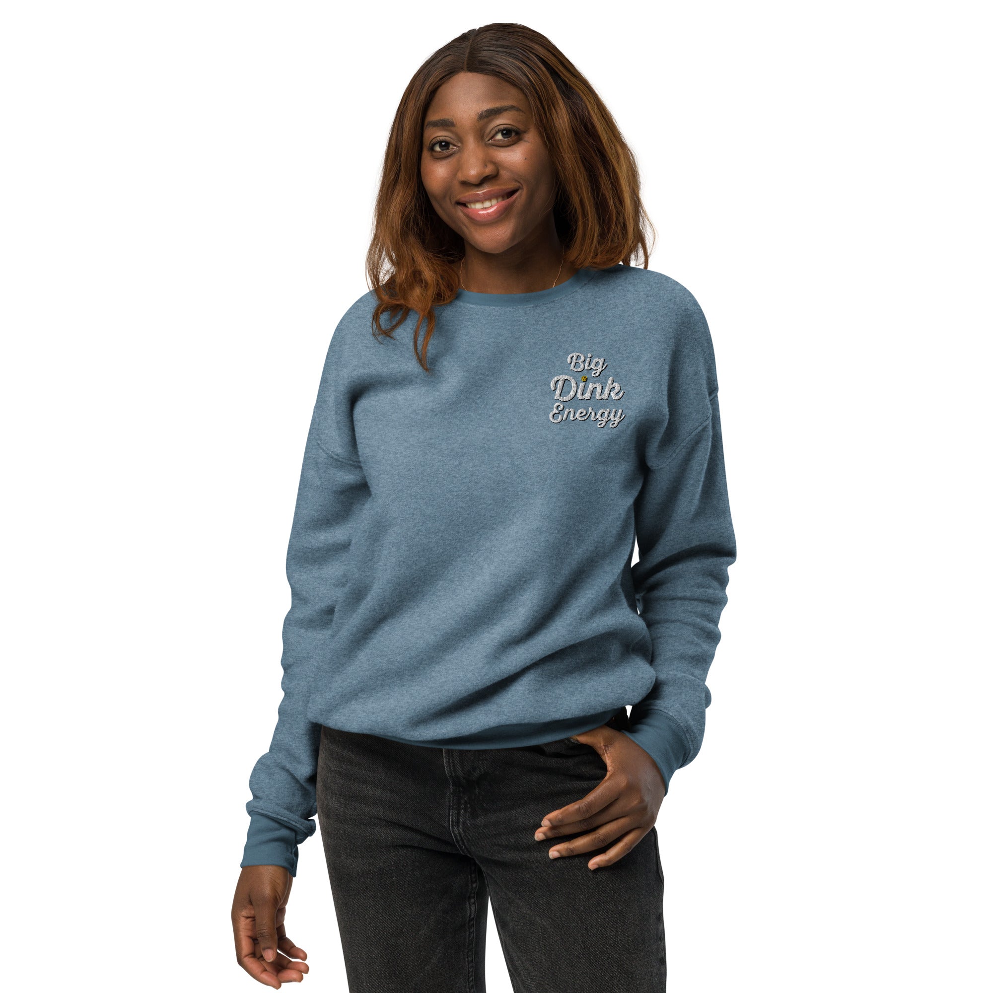 smiling woman wearing light blue fleece embroidered big dink energy pickleball sweater apparel