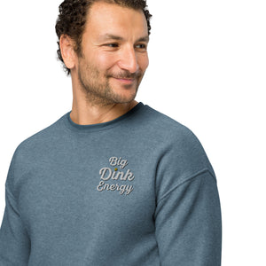 close up of man wearing light blue fleece embroidered big dink energy pickleball sweater apparel