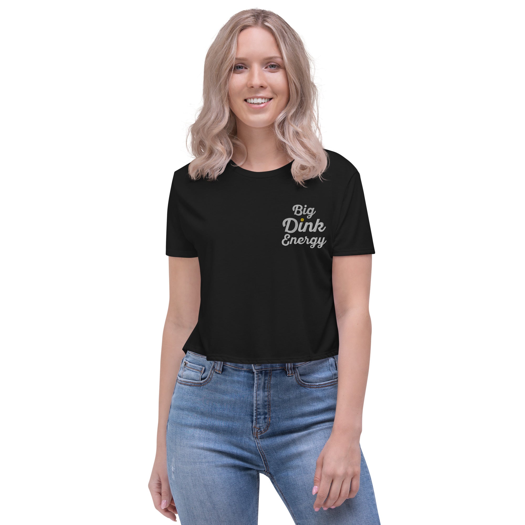 blonde woman wearing black embroidered big dink energy womens crop pickleball apparel shirt