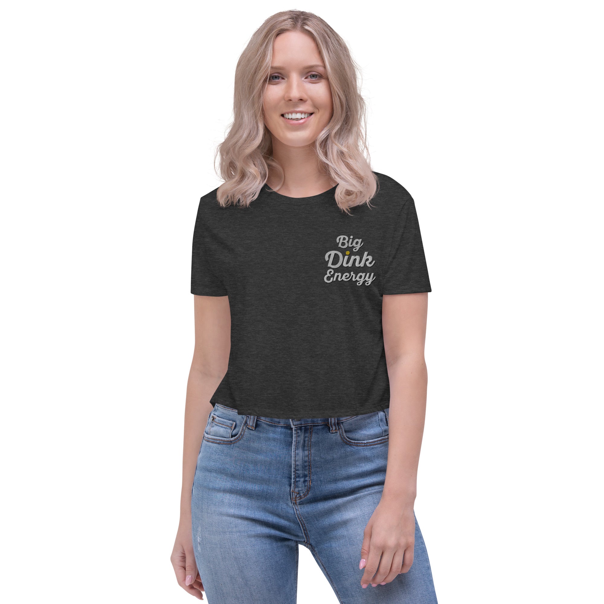blonde woman wearing dark gray embroidered big dink energy womens crop pickleball apparel shirt