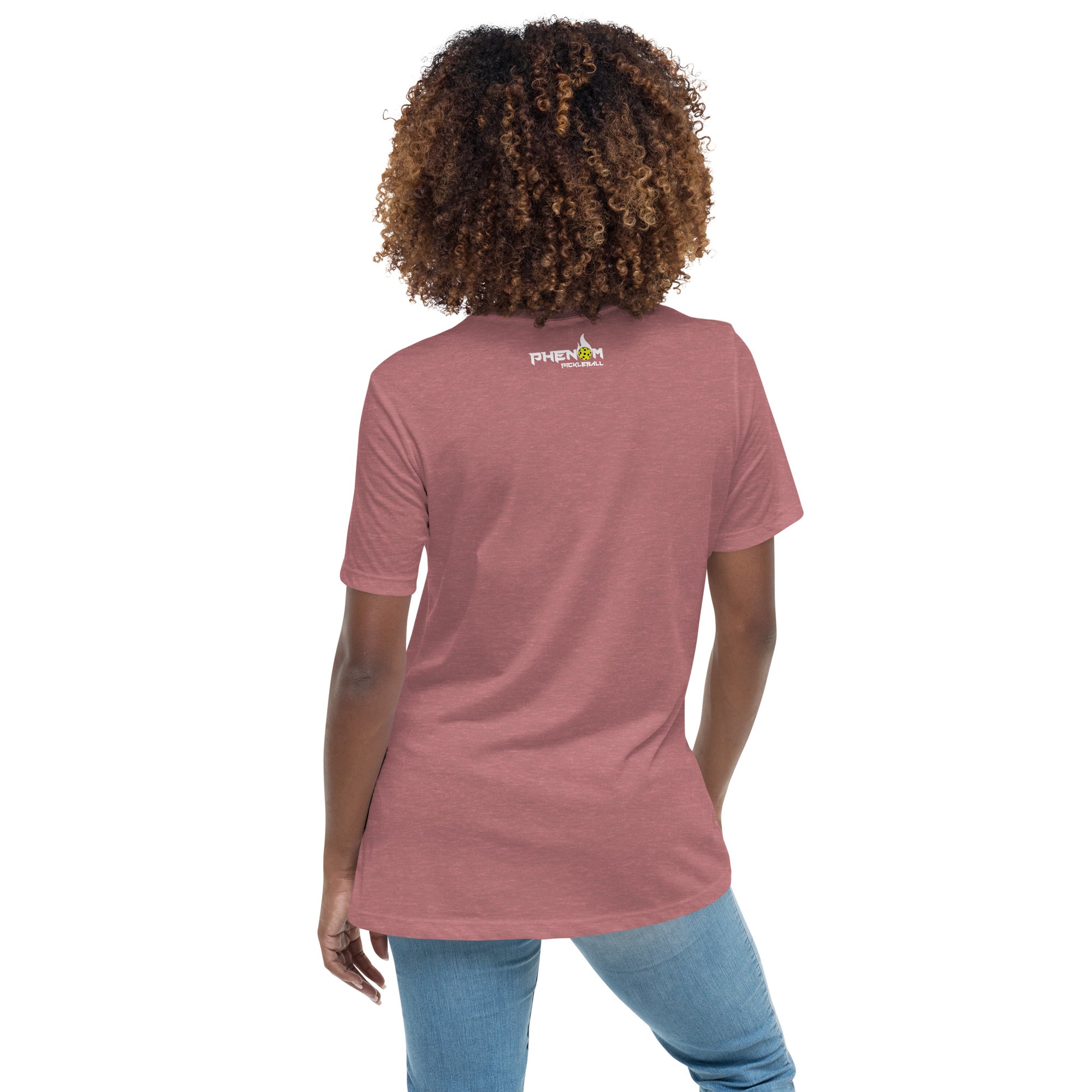 smiling woman with curly hair wearing toasted mauve women's but first pickleball shirt apparel phenom logo back view
